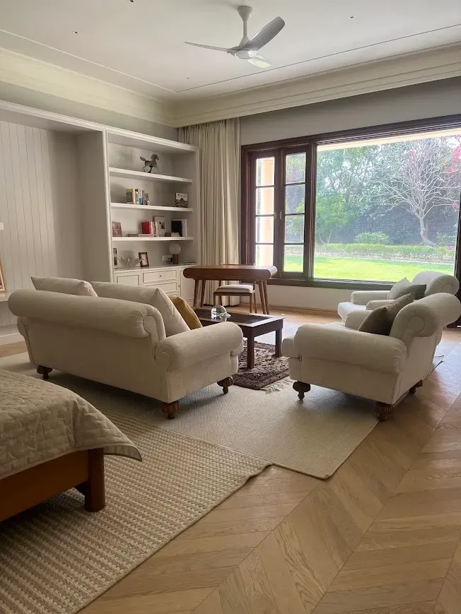 The living room and its garden window at the Delhi farmhouse