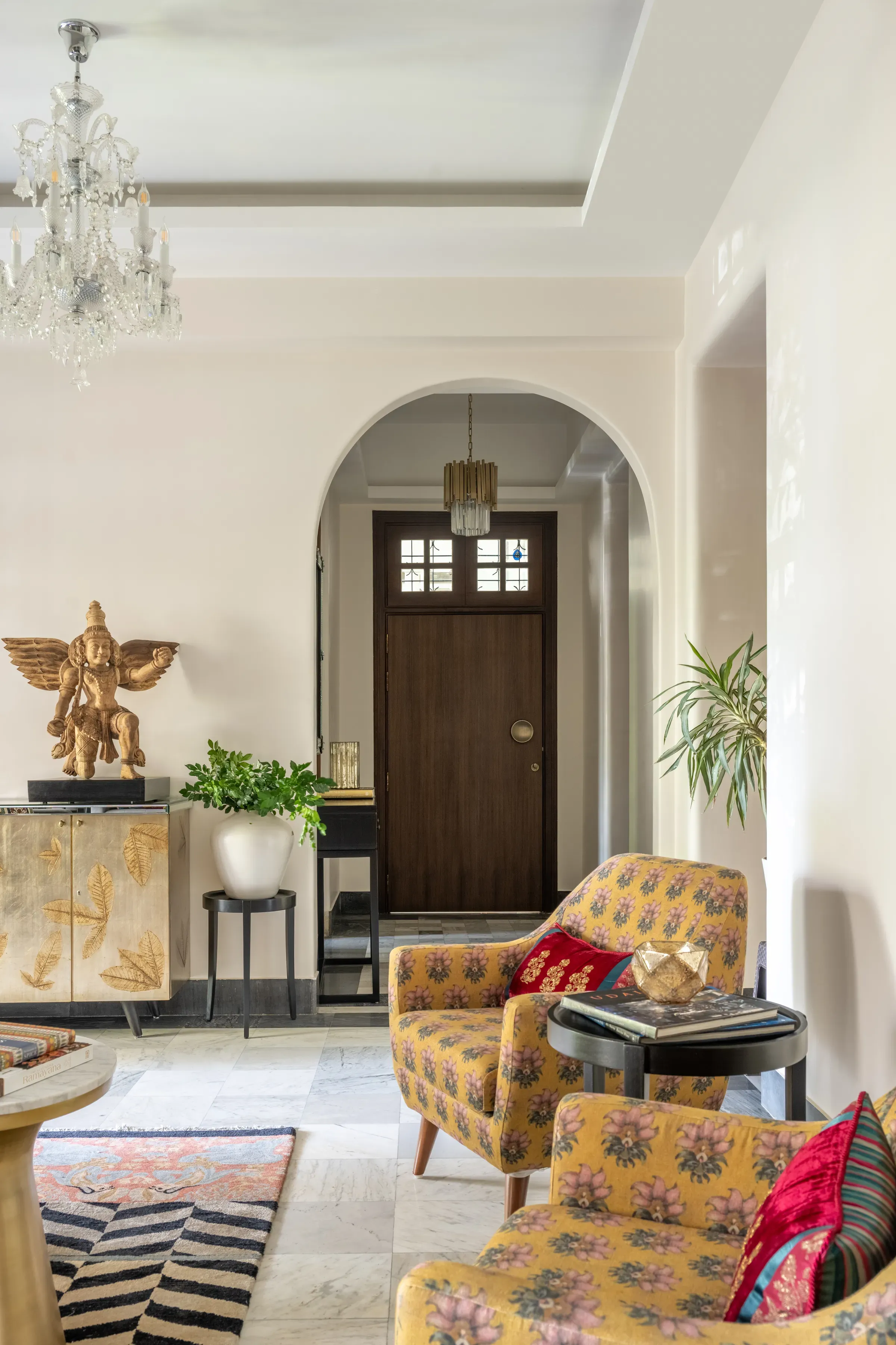 The entrance hall at Nook Home, a Garuda on the console
