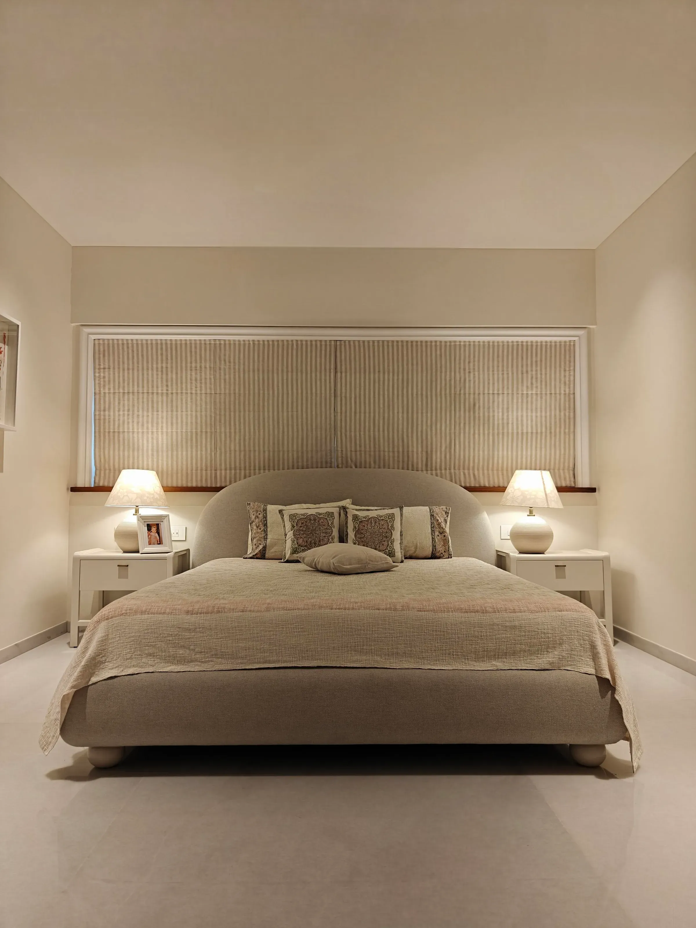 The main bedroom in beige at the Sterling apartment