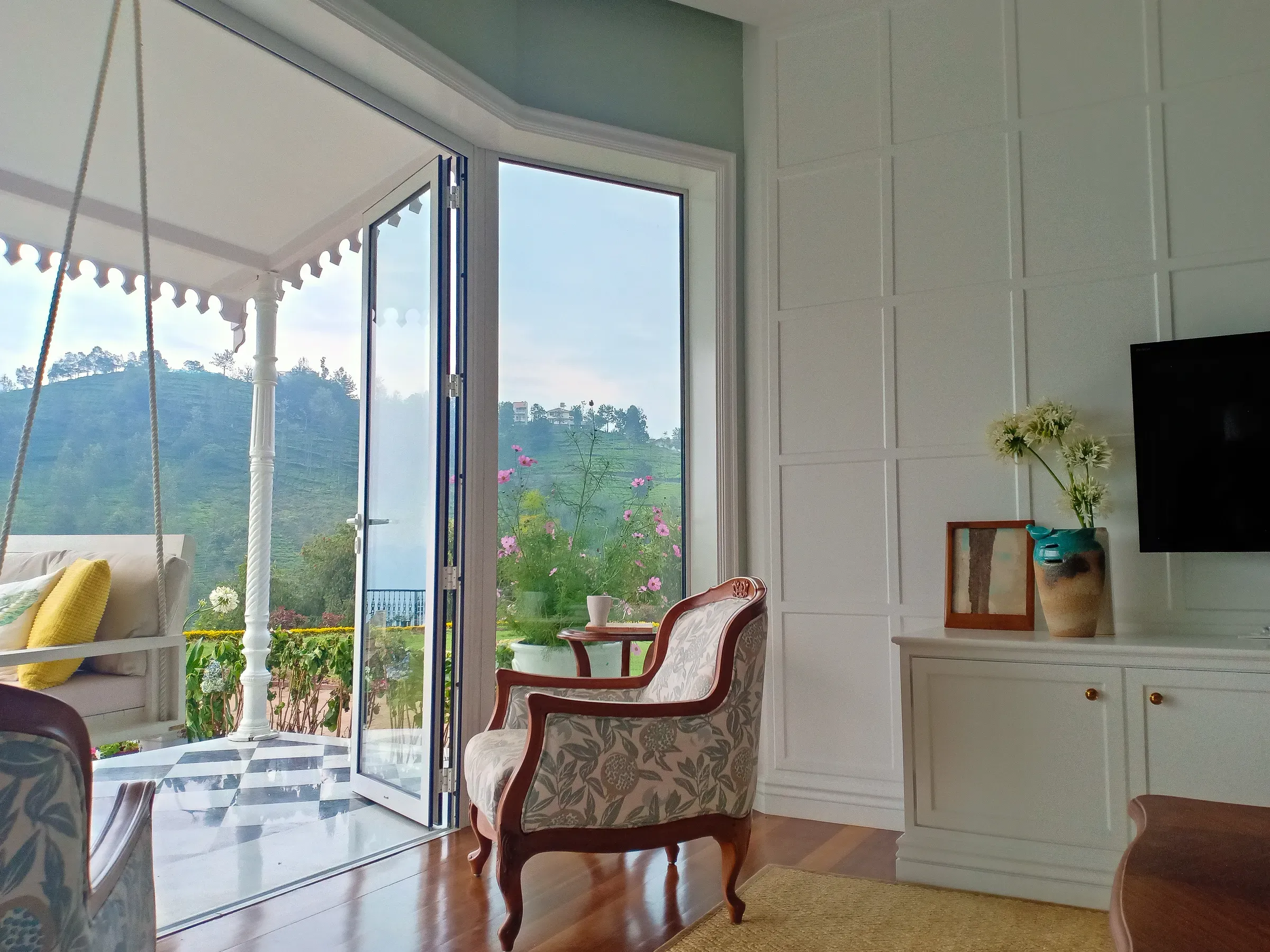 The living room opening onto the verandah at the Coonoor bungalow