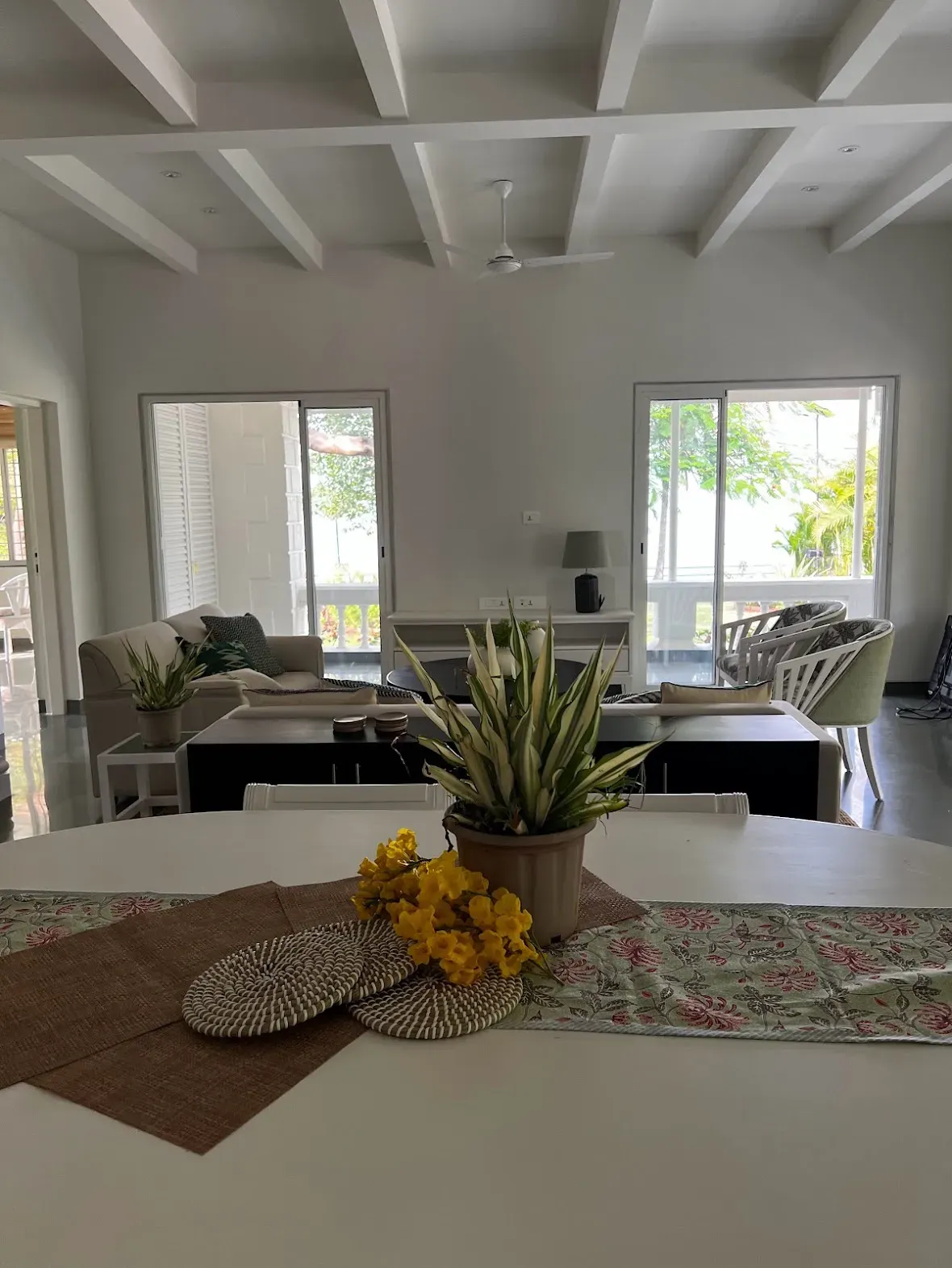 The dining room and the living room beyond at the Malkhed house