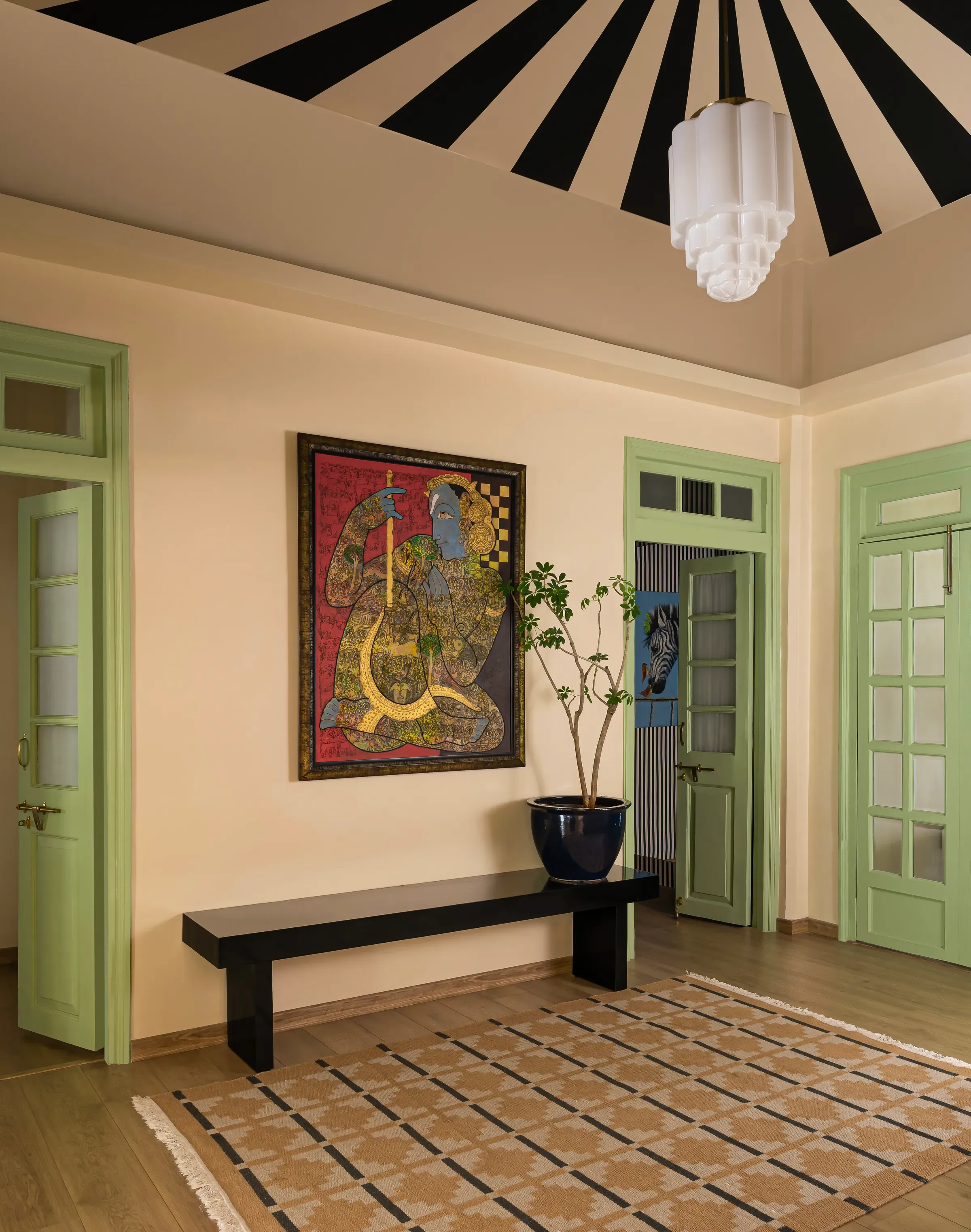 The hand-painted sunburst ceiling in the Tranquila lobby