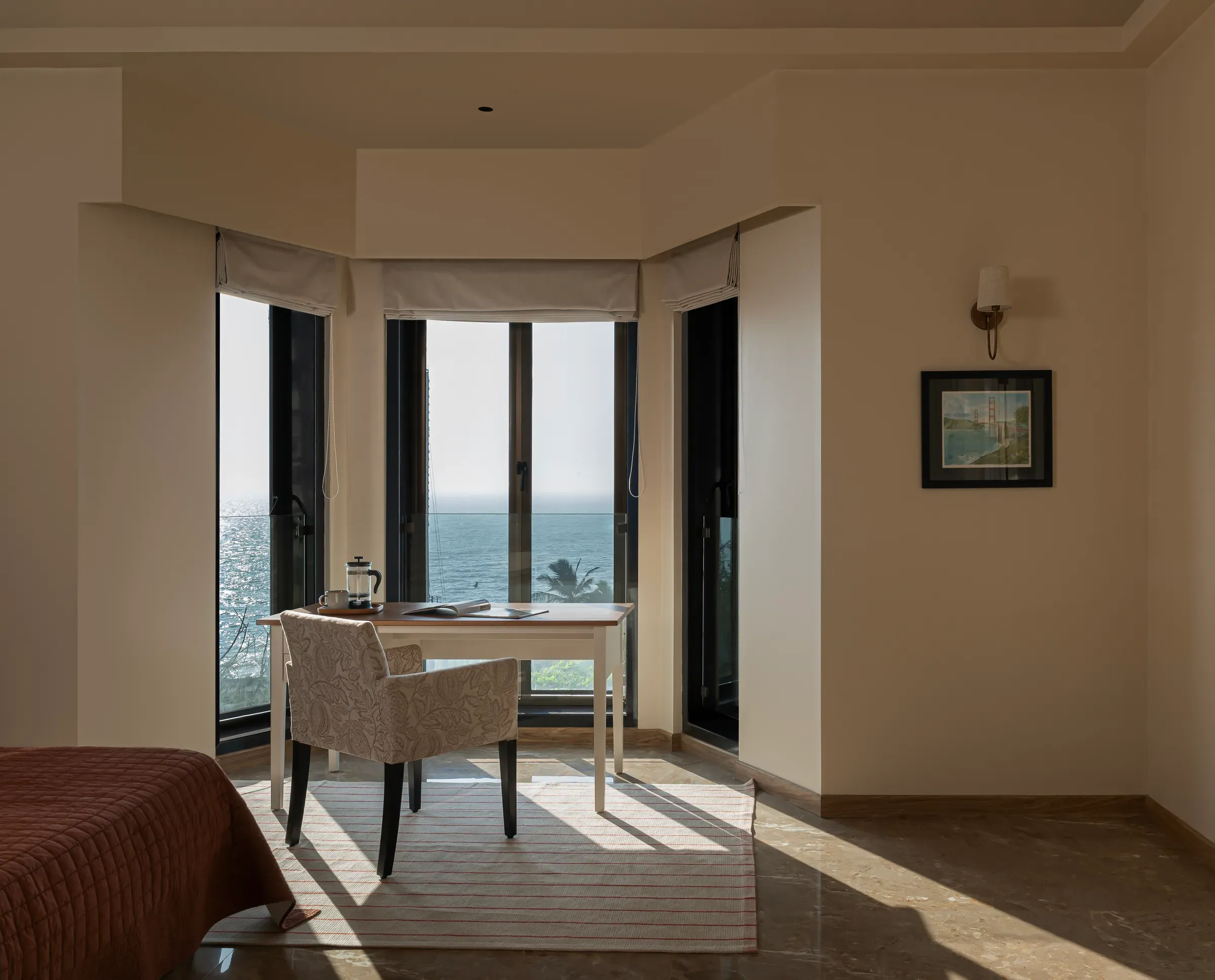 The study at Tranquila, opened up to frame the sea
