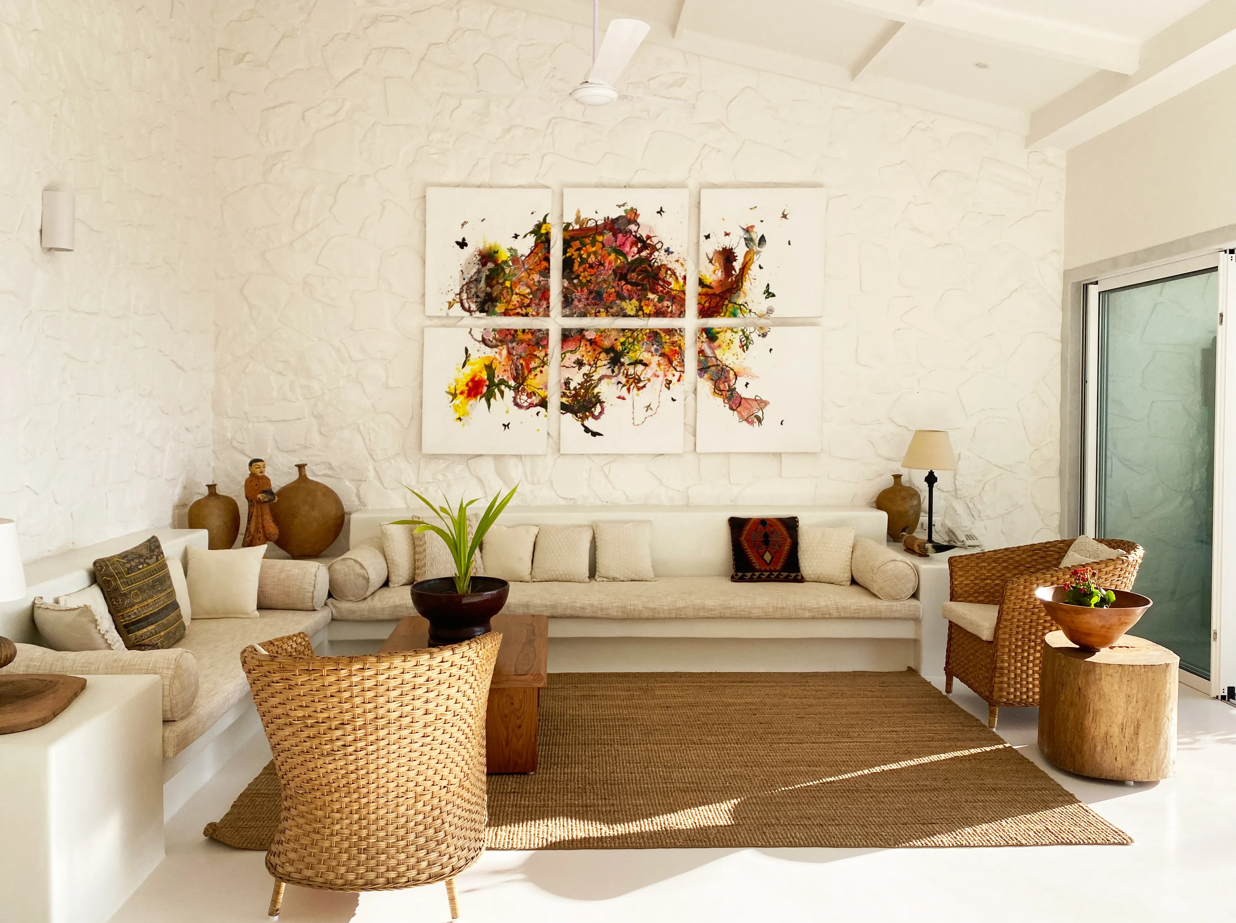 A jute rug and low table in the sitting area at the Marve beach house