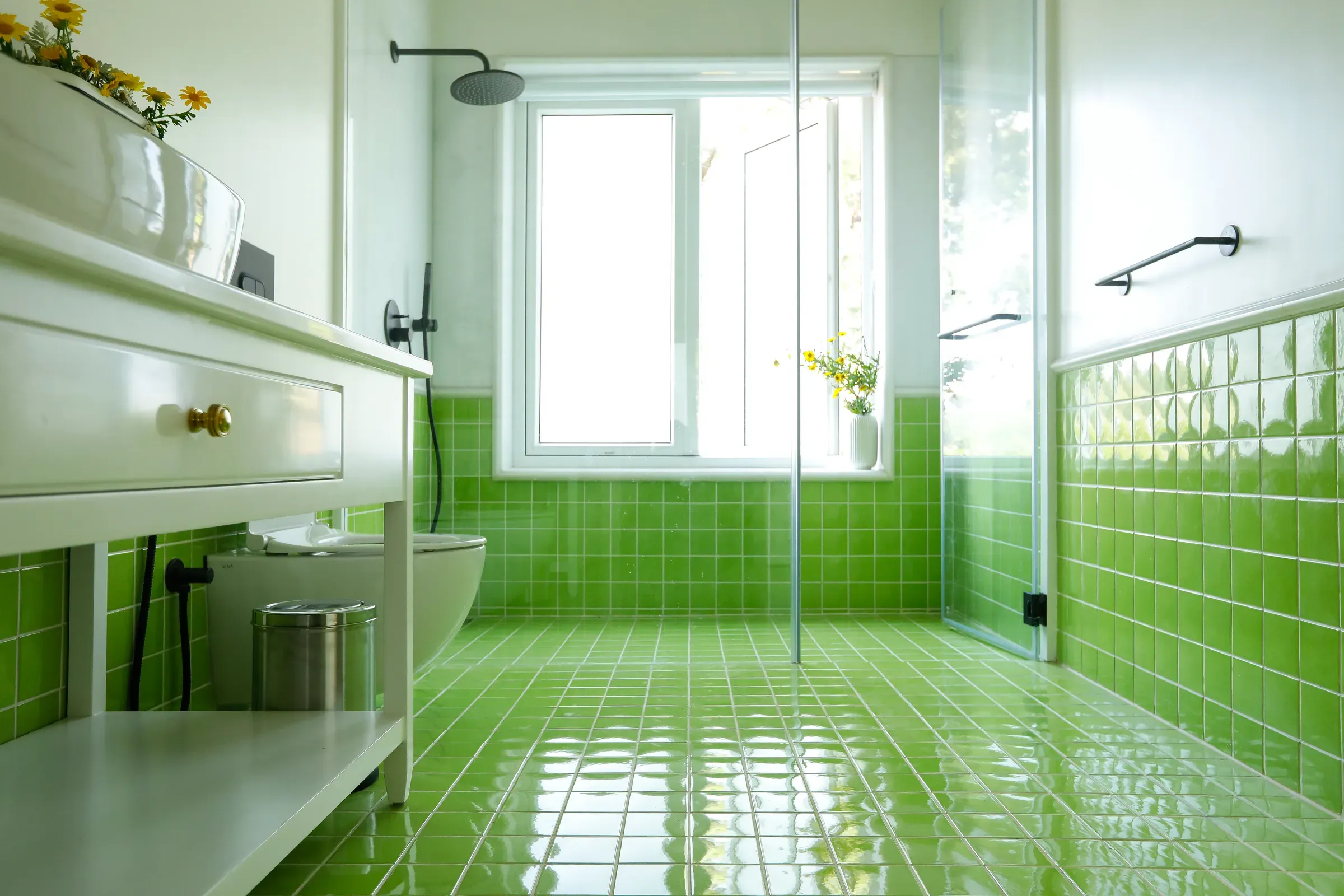 The green-tiled bathroom at the Coonoor bungalow
