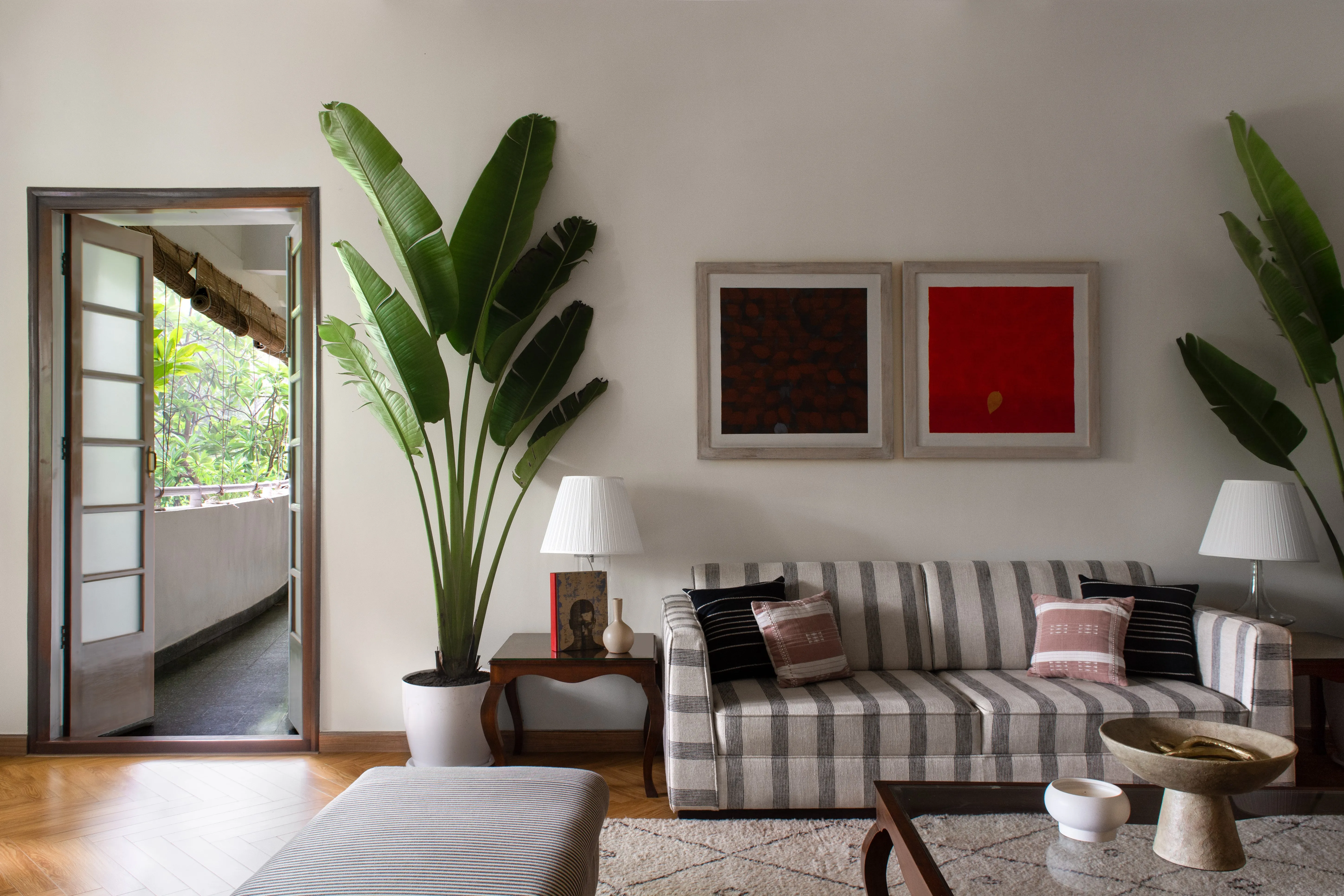 Living room with striped sofa and art, Kala Ghoda